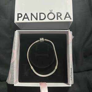 Original Pandora sterling silver snake chain 7” bracelet with a barrel clasp.